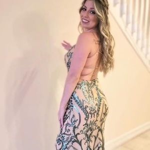 Green sequins dress, double layered, built in padding.